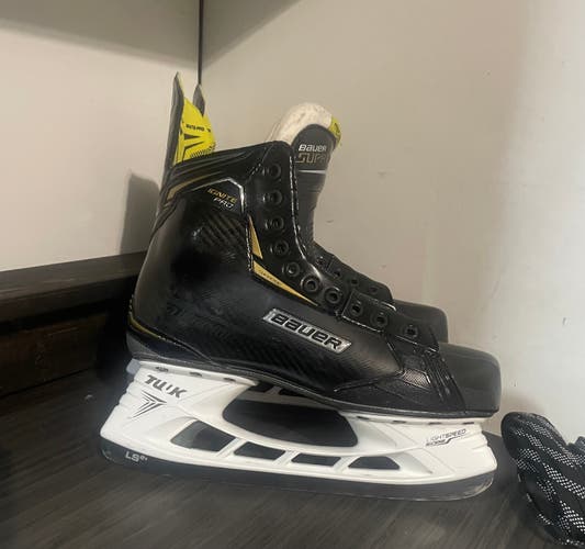 Used Senior Bauer Supreme Ignite Pro Hockey Skates Regular Width 9.5