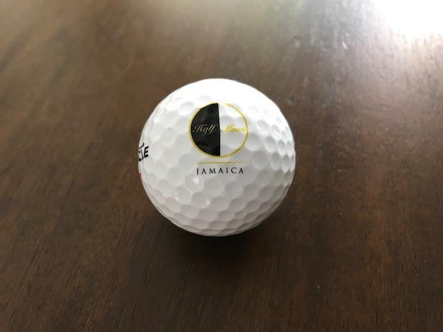 Logo Golf Ball Half Moon Club Jamaica