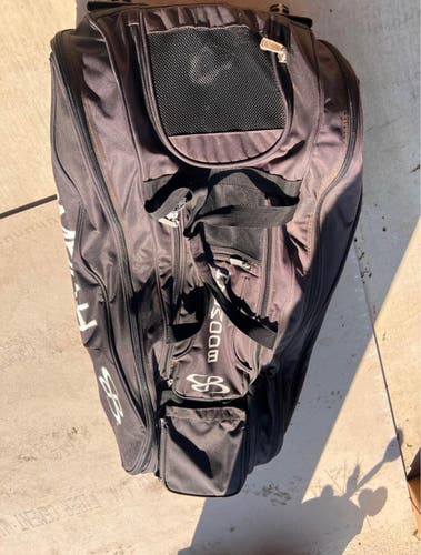 Used Black Boombah beast roller bag