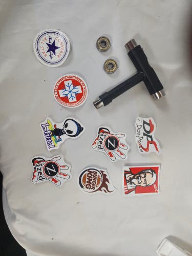 New Skateboard ABEC-11 Bearings with Skateboard T Tool and Variety Pack of Stickers