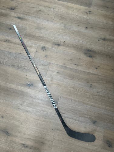 Used Senior Bauer Left Hand P28 Vapor Hyperlite Hockey Stick