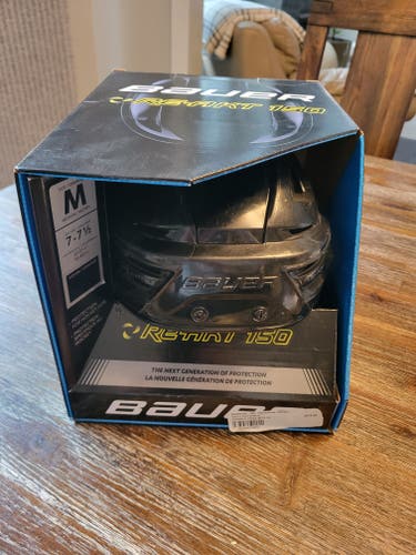 Used Medium Bauer Re-Akt 150 Helmet
