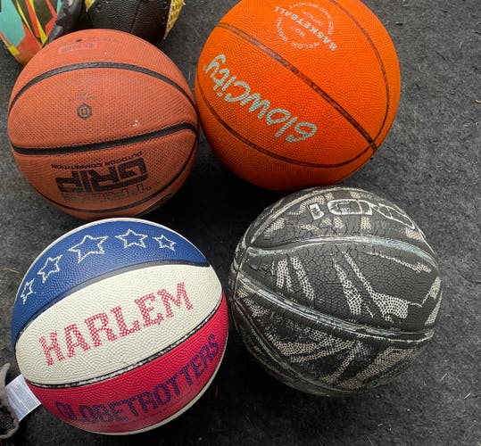 4 used basketballs
