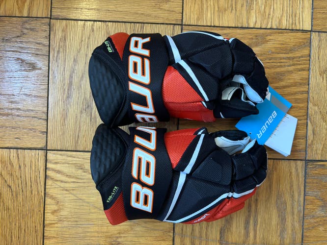 Bauer hyperlite gloves Intermediate size 13 Black and Orange