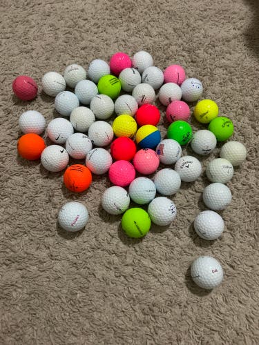 Used 50 Pack Of Assorted AAAA Golf Balls Mint Condition