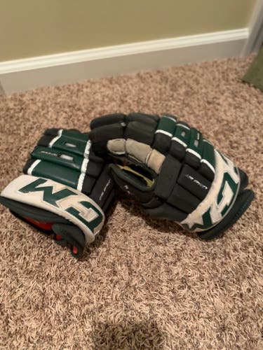 Used CCM 13" Tacks 4 Roll Pro Gloves