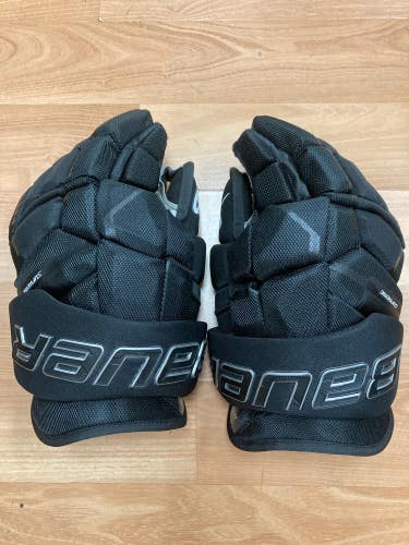 Black Used Senior Bauer Supreme Mach Gloves 14"