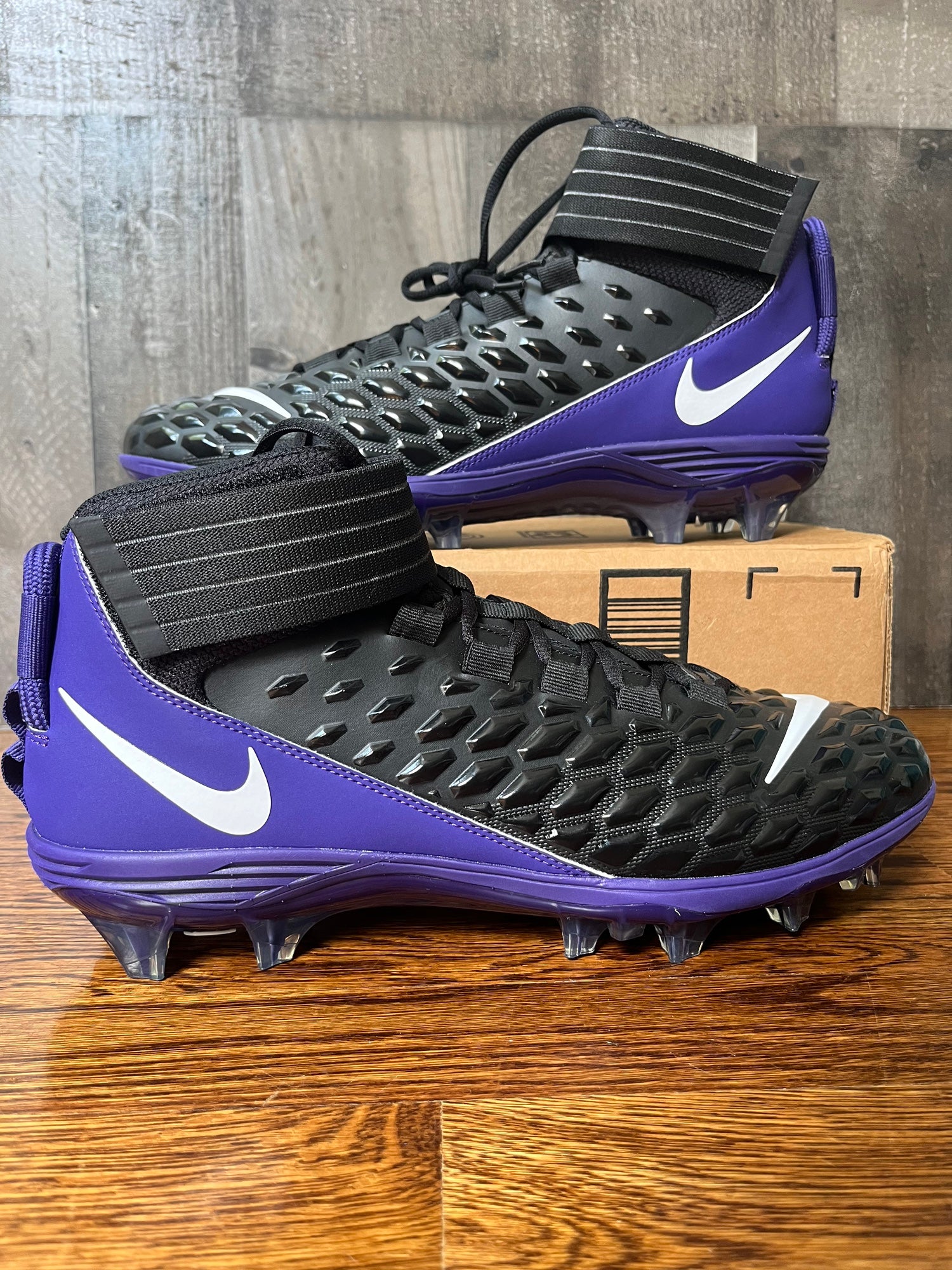 purple and black football cleats
