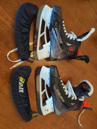 Used Intermediate Bauer Vapor X5 Pro Hockey Skates Regular Width Size 4.5