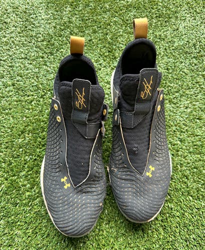 Bundle of 3 used helmets and 3 used metal baseball cleats