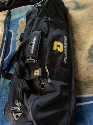 Used DeMarini Baseball/Softball Bat And Equipment Bag
