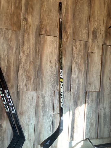 Used Intermediate Bauer Right Handed P28  Supreme 2S Hockey Stick