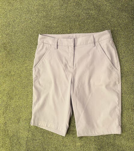 Puma women’s lavender Bermuda golf shorts, size 4