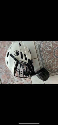 Lacrosse helmet with goalie throat guard
