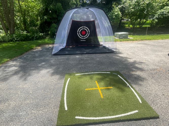 Golf mat and net comes with tees
