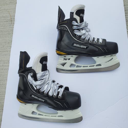 Used Junior Bauer Supreme One100 Hockey Skates Regular Width Size 2.5