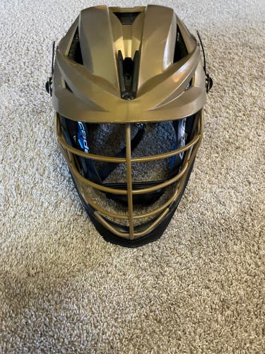 Gold Lacrosse helmet