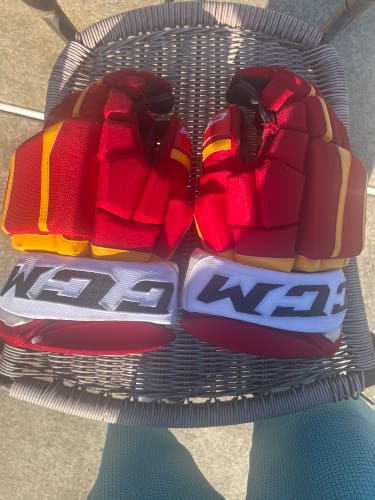 Used  CCM 14" Pro Stock Flames Pro Model Gloves