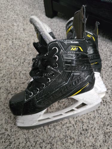 Used Junior Bauer Supreme M1 Hockey Skates Regular Width Size 1