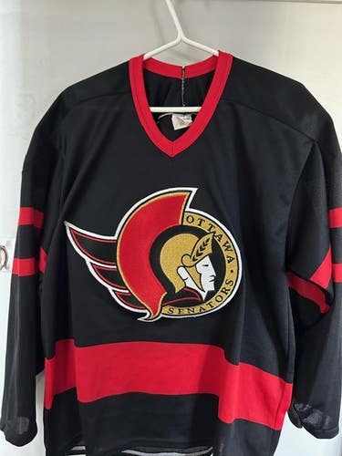 Ottawa Senators (MiC) Made in Canada Size Large Black CCM Game Jersey.
