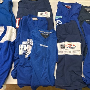 9-Used Hockey Jerseys -Royal/Navy Youth