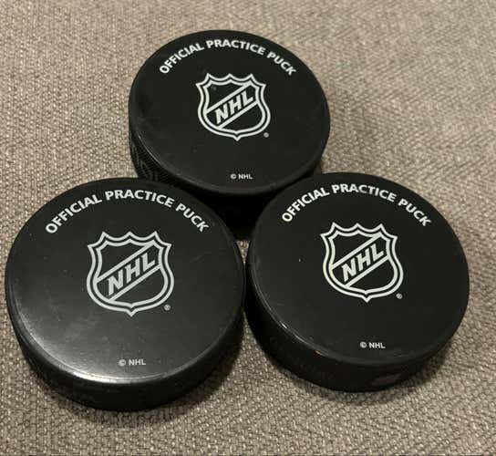 Lot of Three NHL Official Practice Hockey Pucks
