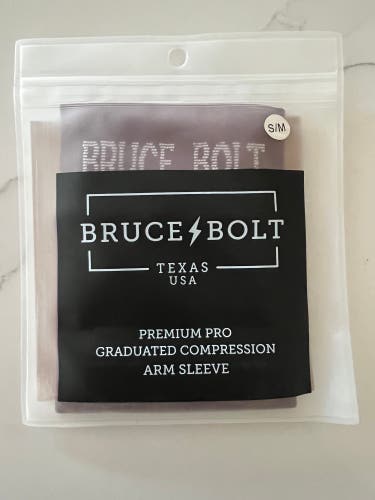 Brand new Bruce Bolt Compression Sleeve Maroon Adult S/M