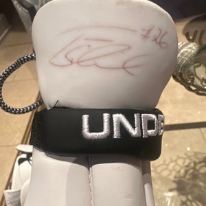 Brand new under armor gloves signed by Tom Schreiber
