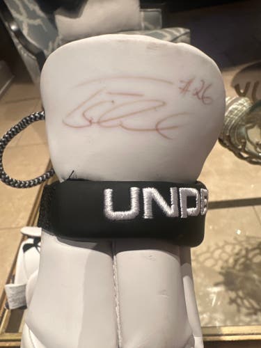 Brand new under armor gloves signed by Tom Schreiber