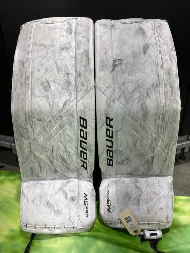 White Used Medium Intermediate Bauer Supreme M5 Pro Goalie Leg Pads