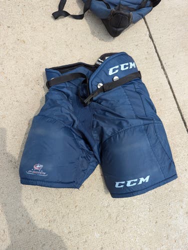 Used CCM Hockey Pants Youth Large 22-24" 56-6cm Blue - only 10 games - Columbus Jr Blue Jackets
