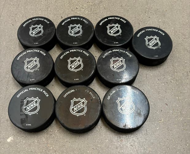 10 Official NHL Hockey Practice Pucks Slightly Used