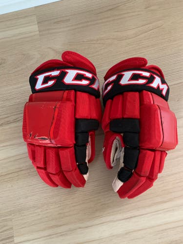 Red and Black Carolina Hurricanes Pro Stock CCM HG97 Gloves 15"