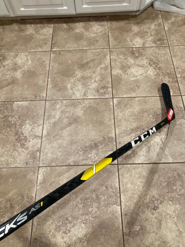 CCM Super Tacks AS1 Left Hand INT 65 Flex Hockey Stick