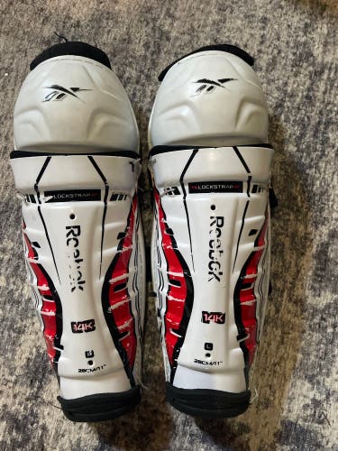 Reebok lock strap, shinguards