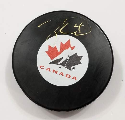 TAYLOR HALL Autographed Team Canada Signed Hockey Puck