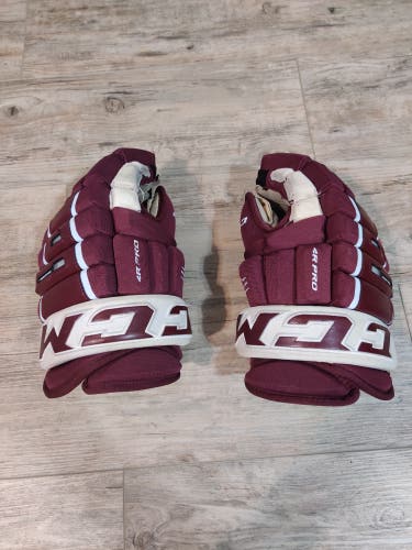 Used CCM 4 Roll Pro Gloves 14" Maroon/White