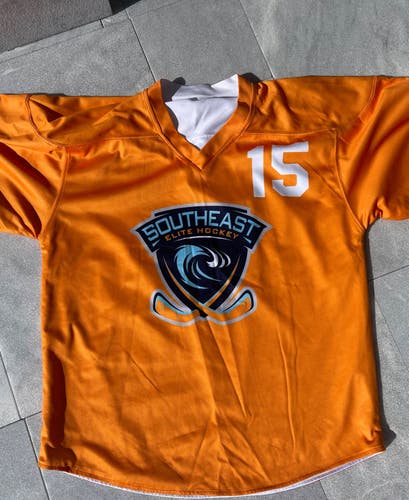 South East Elite Orange/white Used XL Kids Unisex Airius Jersey