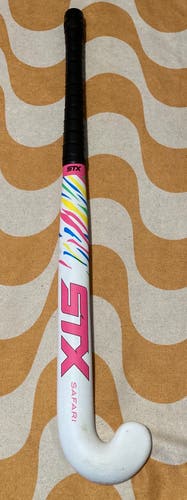 Lightly Used multi colored STX Safari 28” field hockey stick