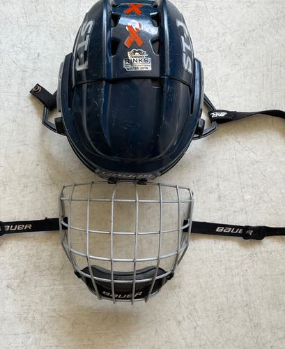 Used Youth Bauer Re-Akt 100 Helmet With Cage