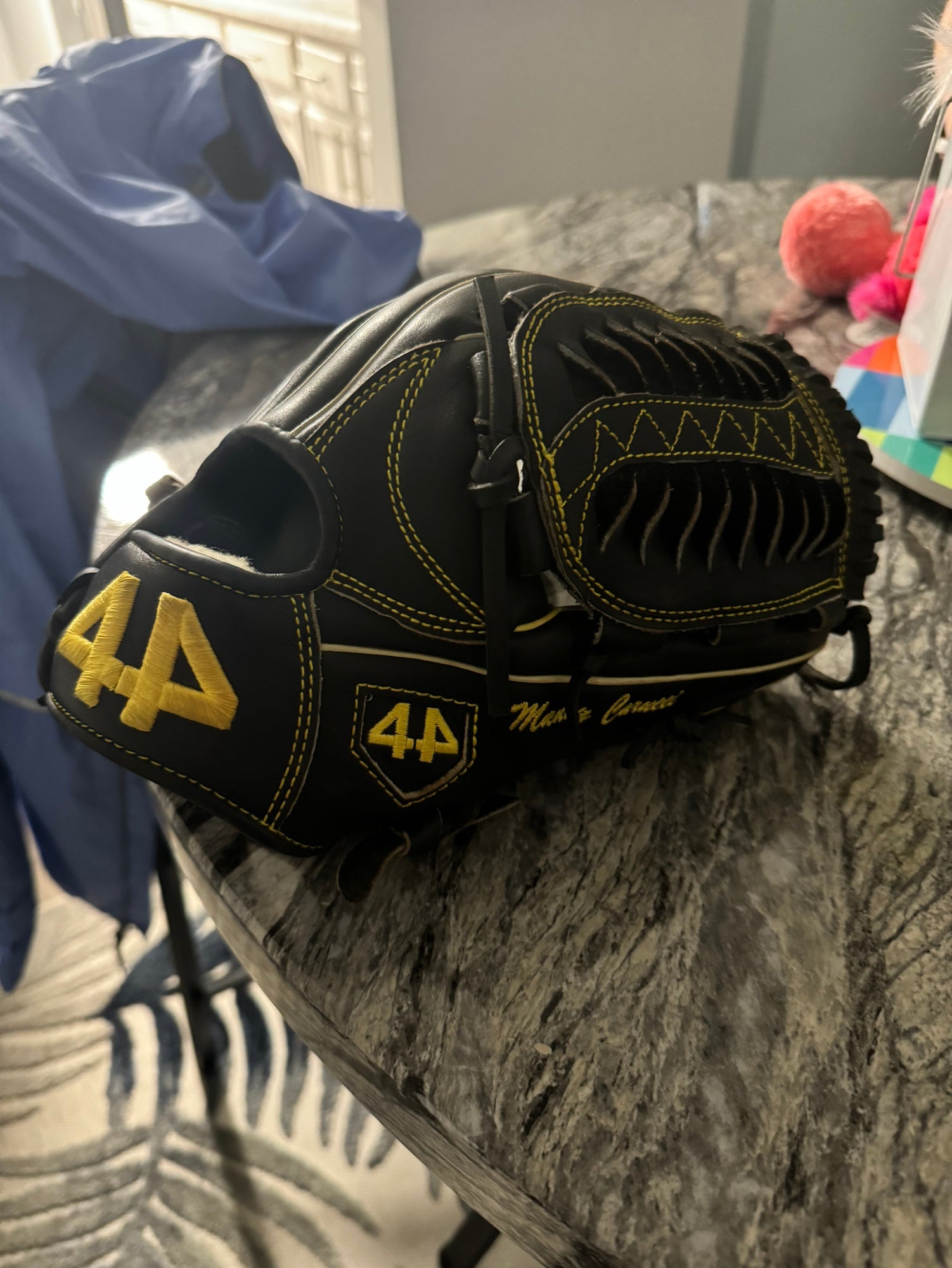 Black & Yellow 44 Glove | SidelineSwap | Buy and Sell on