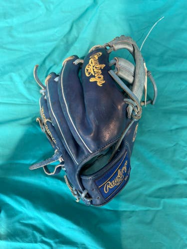 Blue Used Kid Pitch (9YO-13YO) Rawlings Heart of the Hide Right Hand Throw Infield Baseball Glove 11