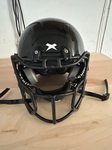 Used Medium Youth Xenith X2E+ Helmet and Xenith shoulder pads