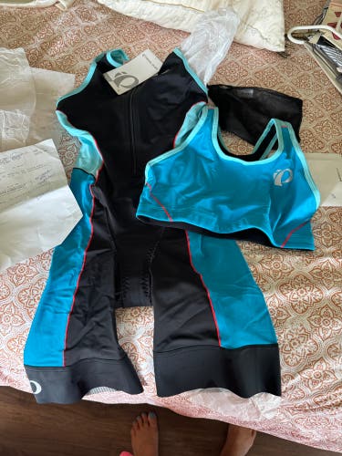 Brand new never worn Triathlete suit and sports bra