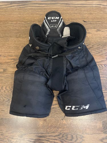 Used CCM LTP Junior Small Black Hockey Player Pants.