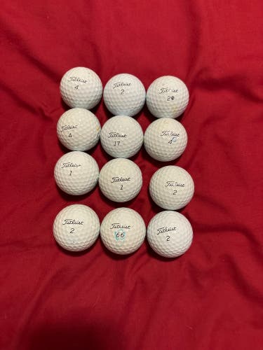 Titleist Pro V1’s (some have company logos some don’t)