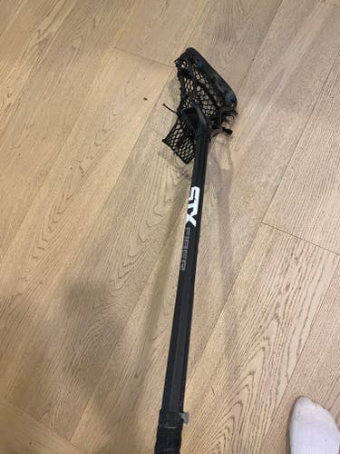 Used StringKing complete stick with STX fiber shaft