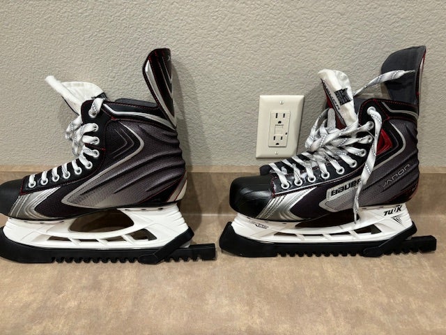 Used adult Bauer Vapor X60 Hockey Skates Regular Width size 9.5 (shoe size 11)