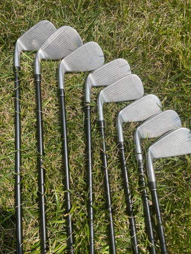 Taylormade used right hand 320 irons with Stiff Graphite shafts