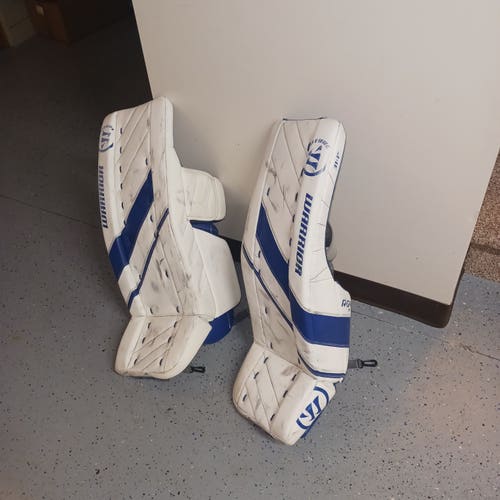 Used Warrior goalie pads
